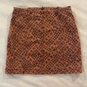 Rust printed Free People skirt. Denim material. Boho chic. Size US small.